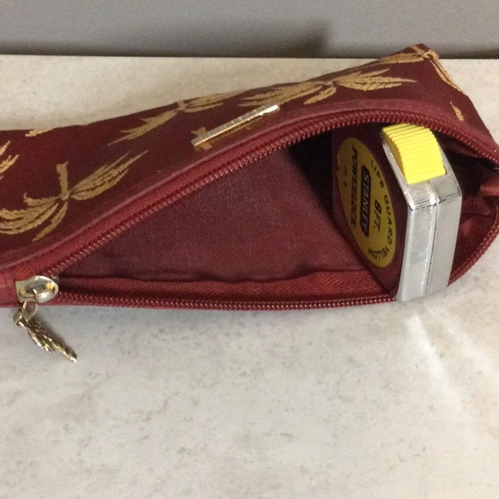 Celebrity Gold Palm-Print Pouch in Burgundy